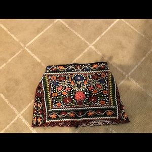 Embroidered mini skirt.